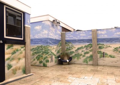Muurschildering trompe-l'oeil zeegezicht