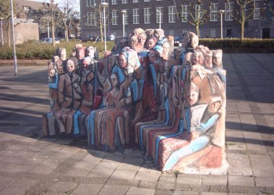 muurschildering diversen stenen bank
